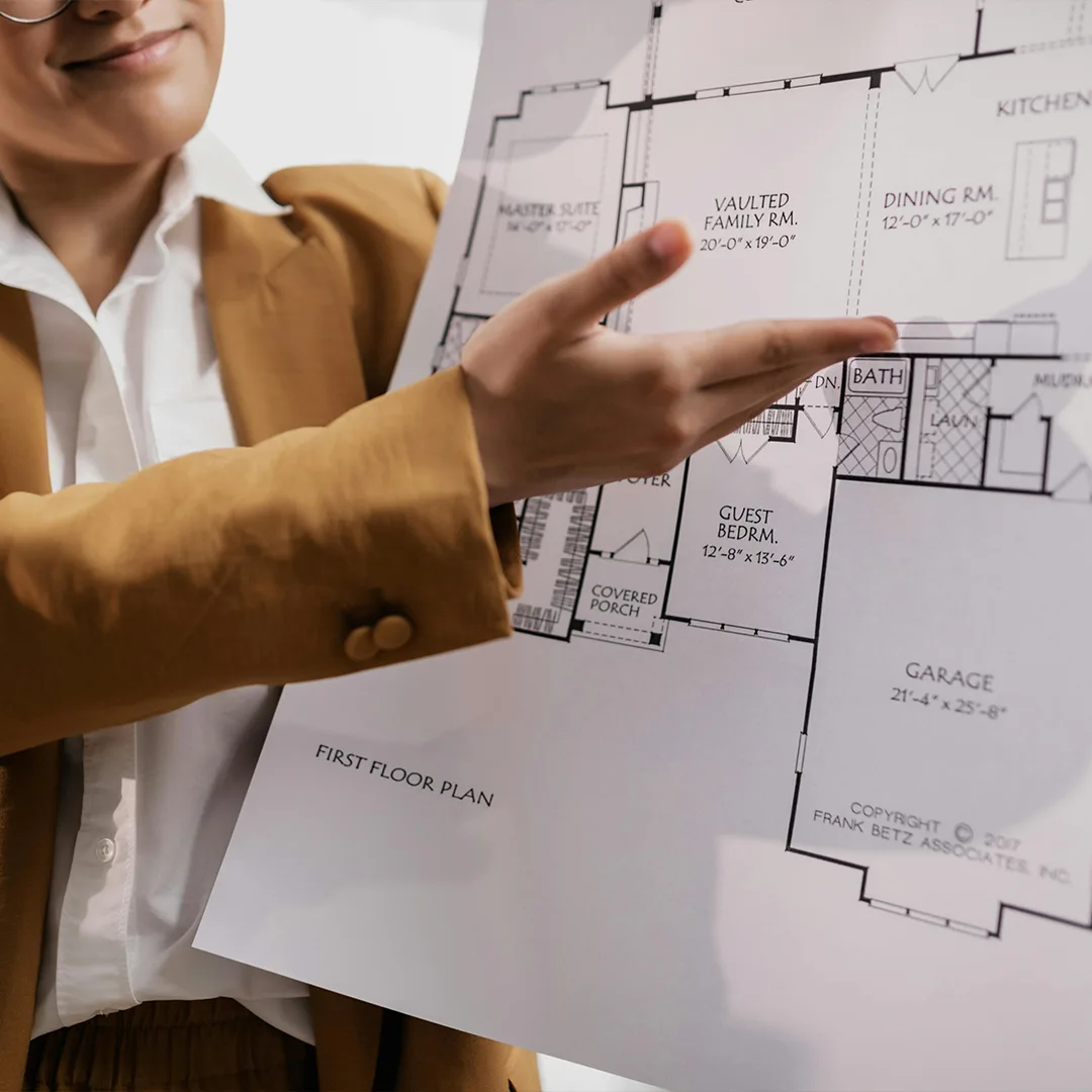 2D floor plan of a house layout, showing the arrangement of rooms, doors, and windows with dimensions clearly marked.