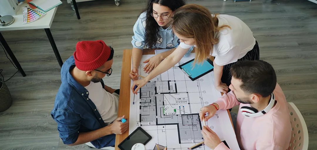 Dream Chaser team working together on a floor plan project
